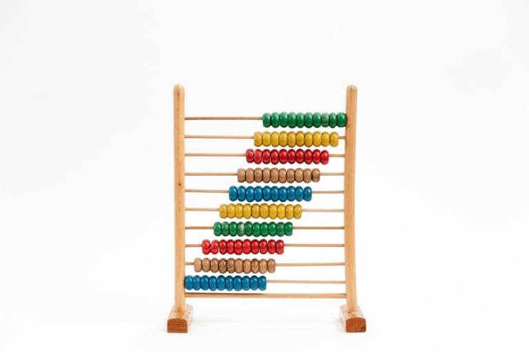 A wooden bead abacus with ten rows of coloured counting beads